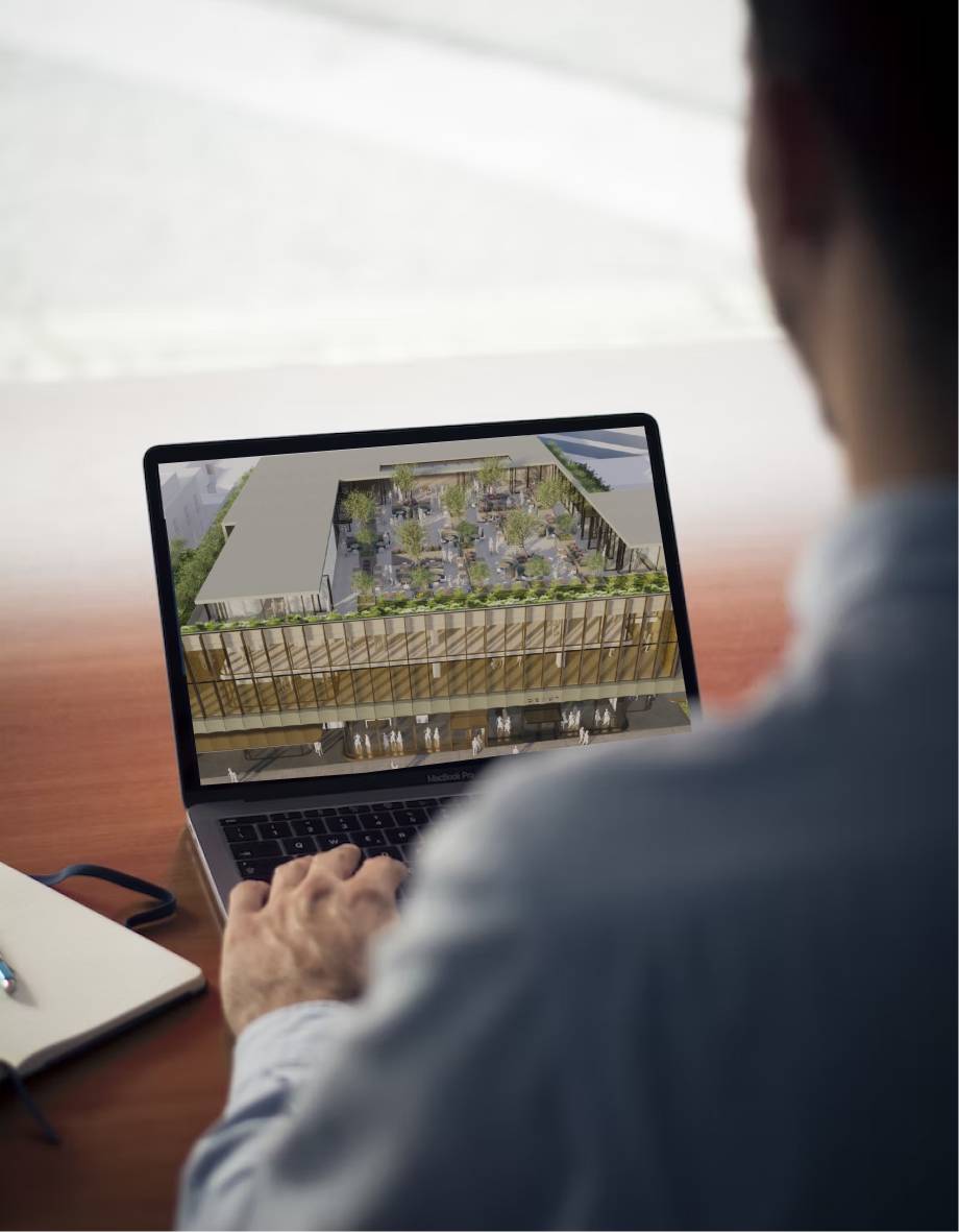 Photo of investor looking at property on a laptop
